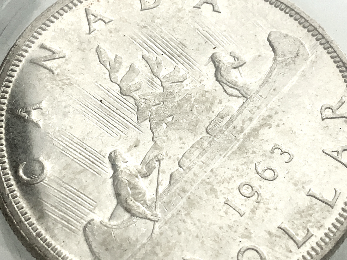 .600 ozt 1963 Voyageur MS-65 $1