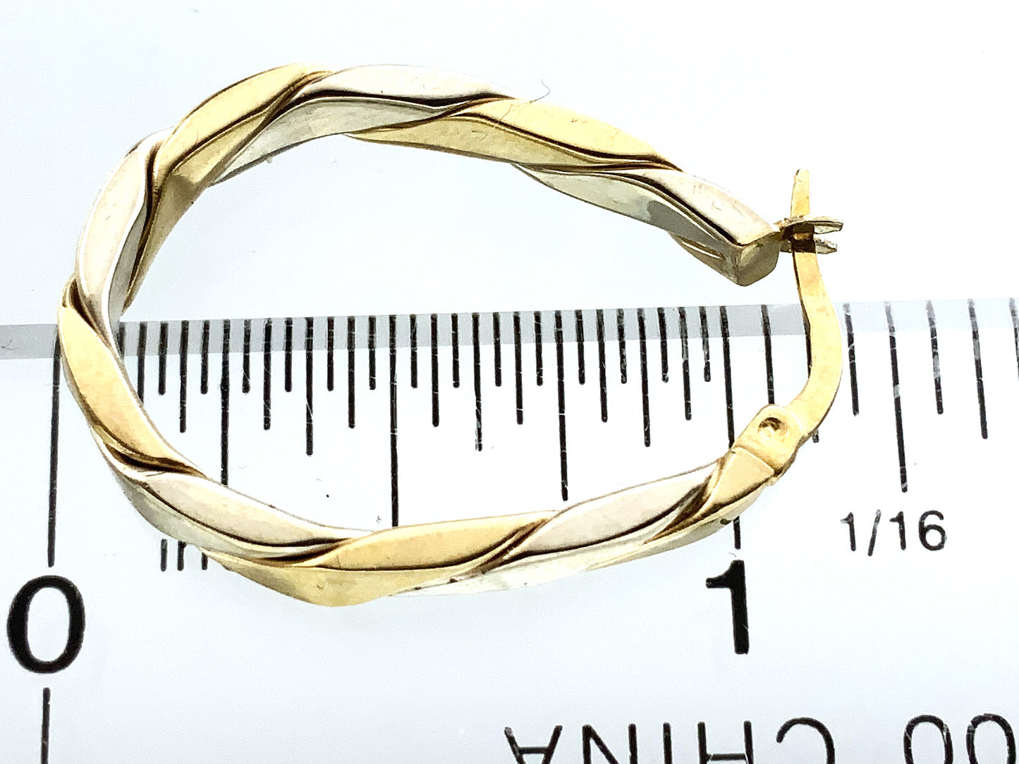 10K Yellow and White Gold Two Toned Twisted Oval Hoop Earrings AU350