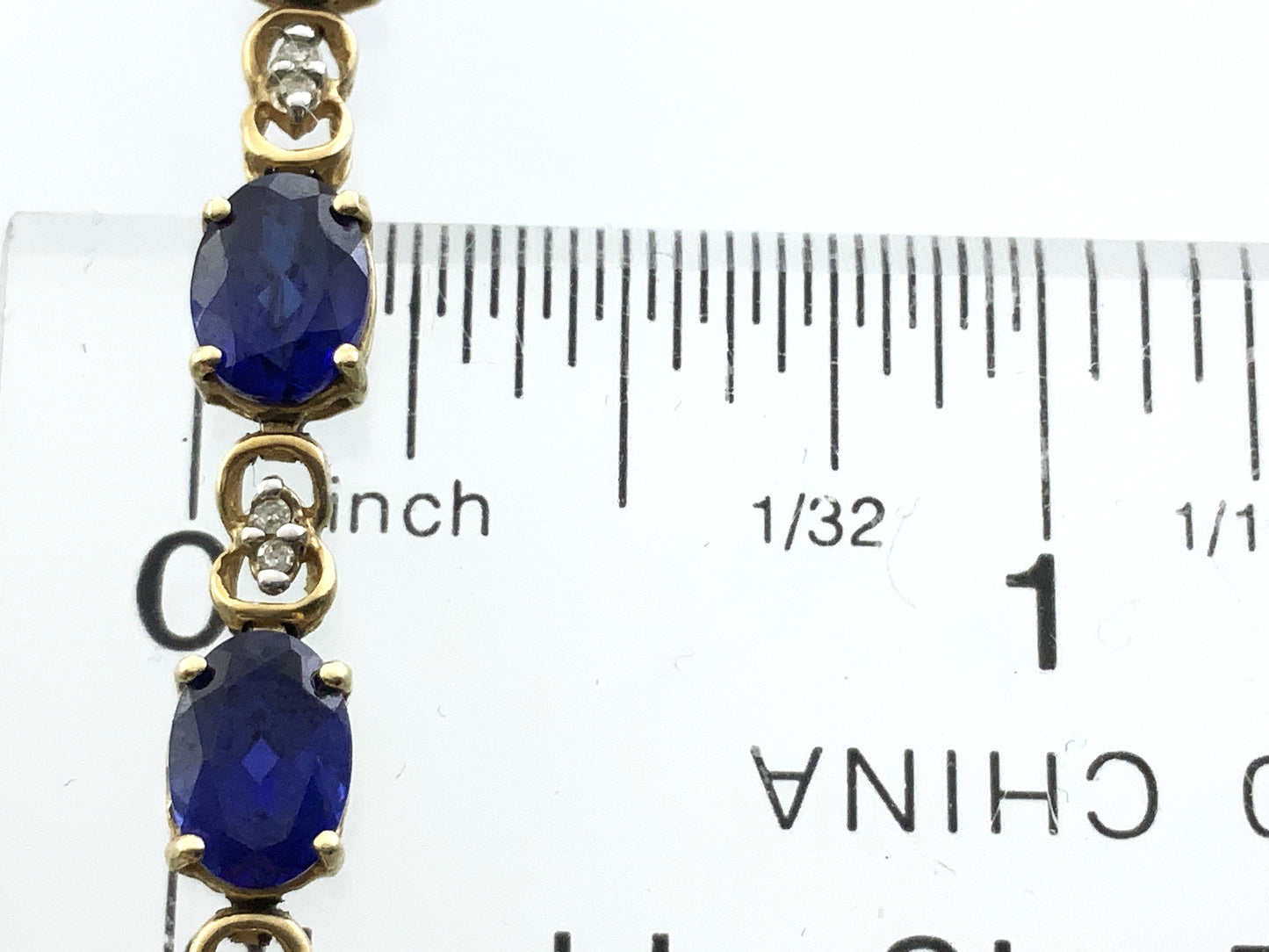10K Yellow Gold Oval Blue Sapphires 7in x 5.1mm Bracelet AU386