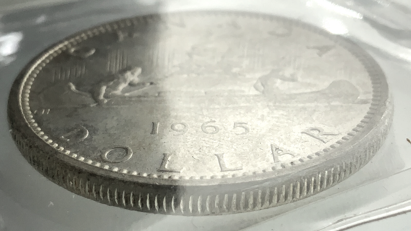 .600 ozt 1965 Voyageur SB P5 MS-65 $1