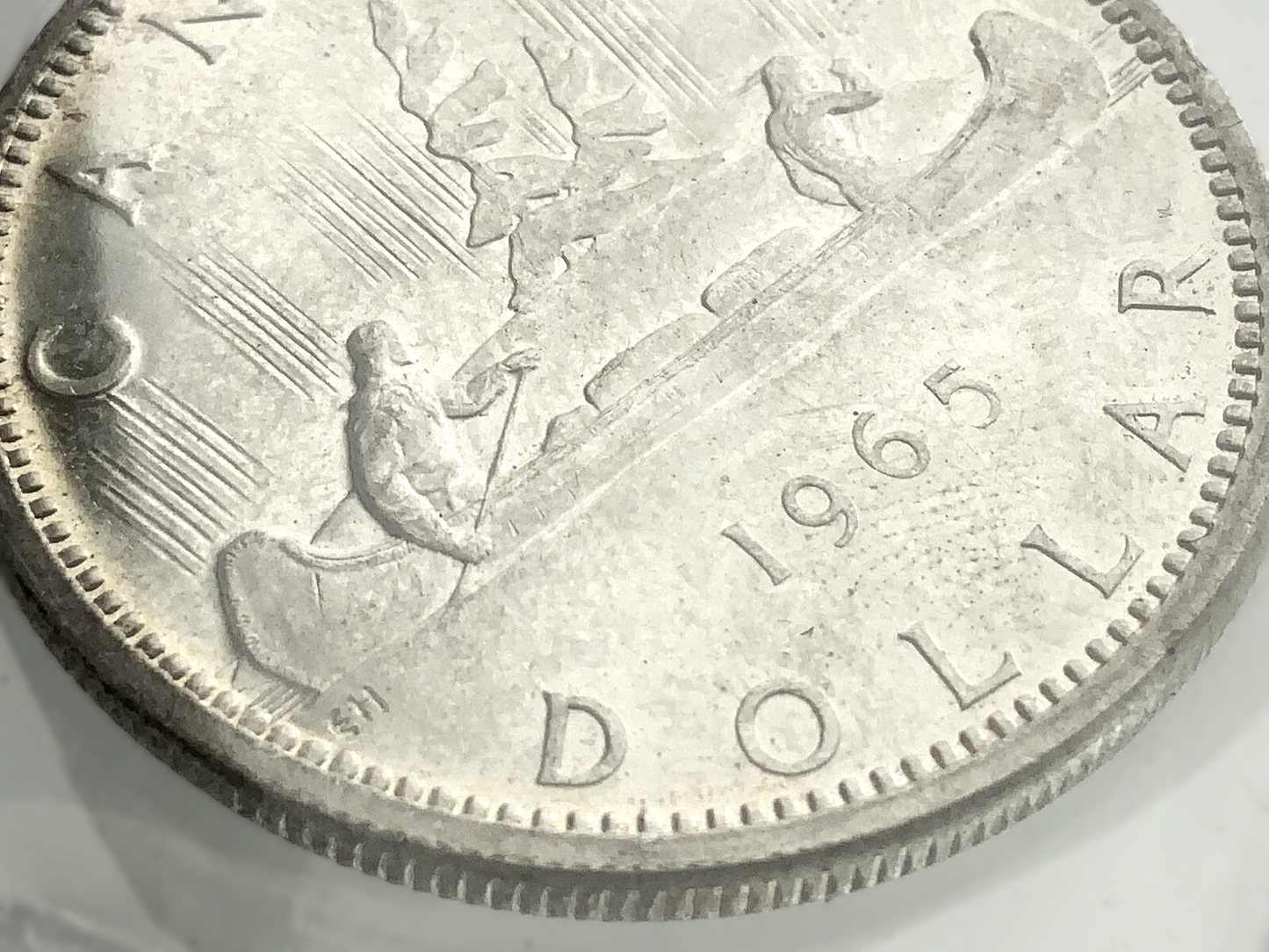 .600 ozt 1965 Voyageur SB P5 MS-65 $1