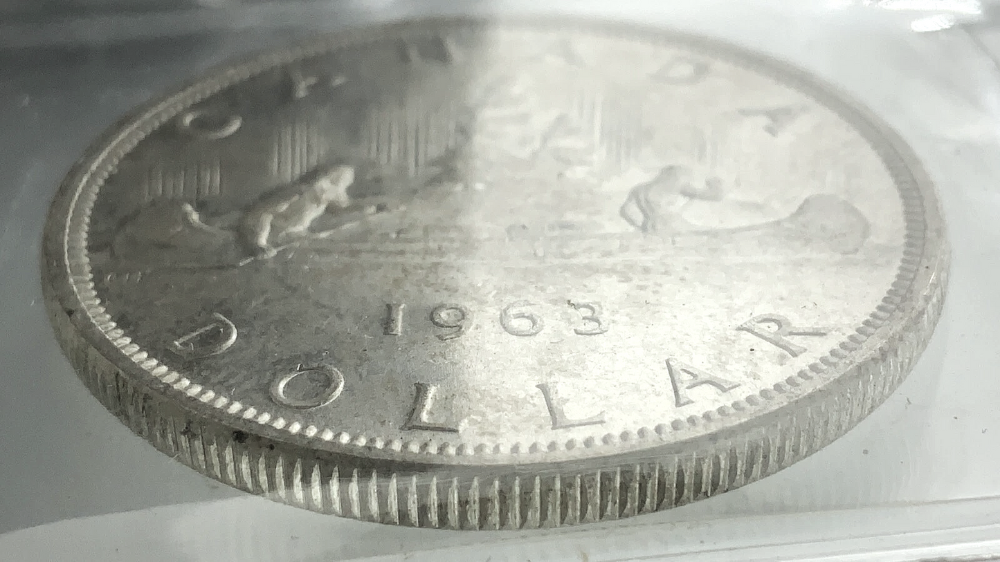 .600 ozt 1963 Voyageur MS-65 $1