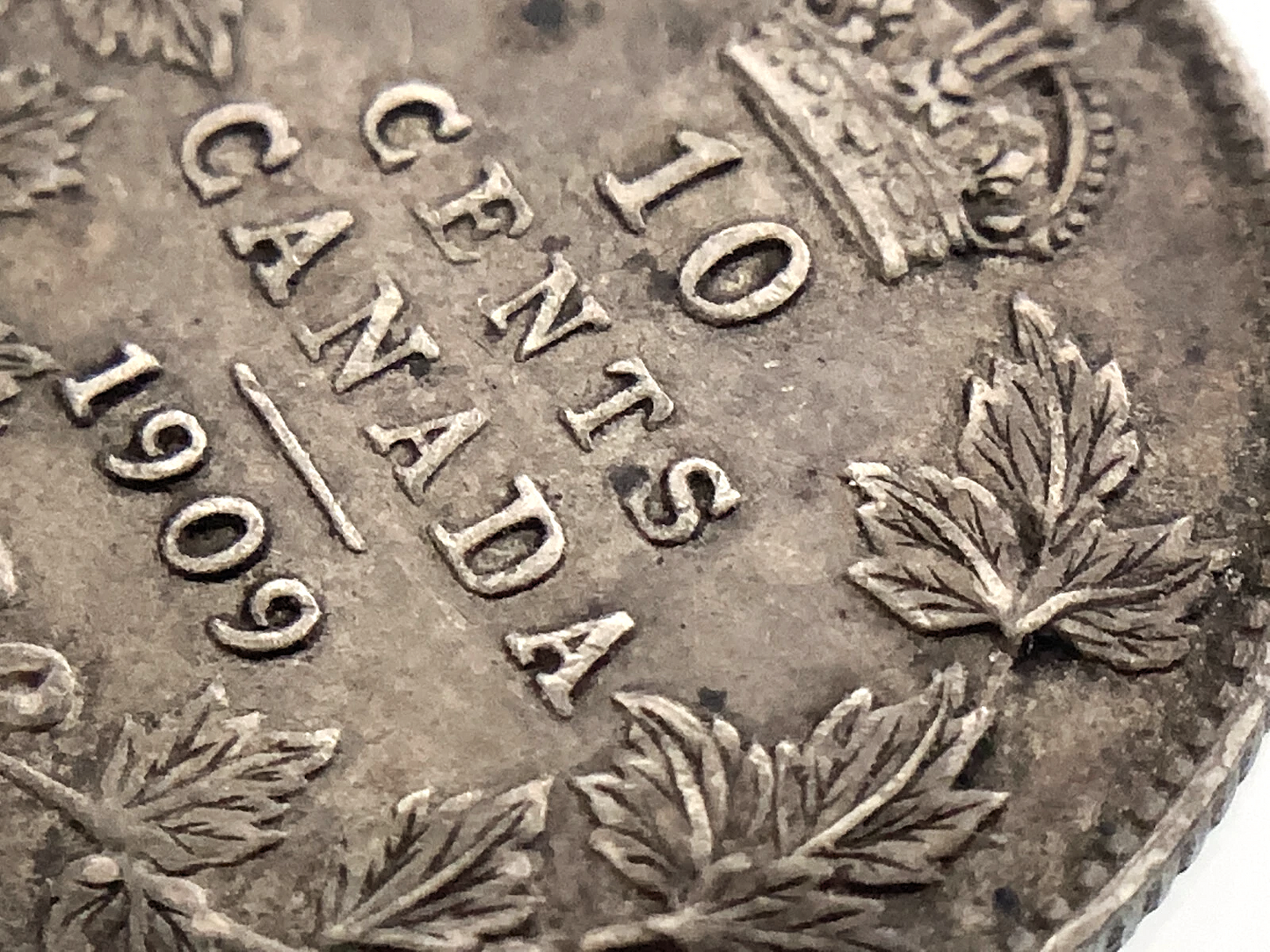 .069 ozt 1909 Broad Leaves Canada 10¢