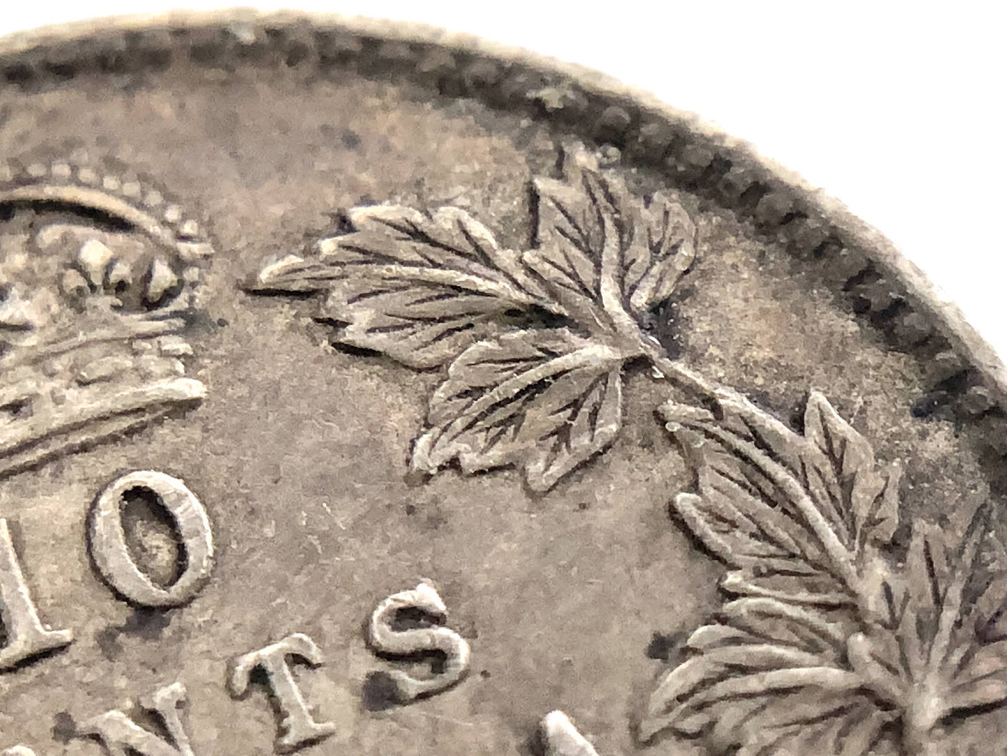 .069 ozt 1909 Broad Leaves Canada 10¢