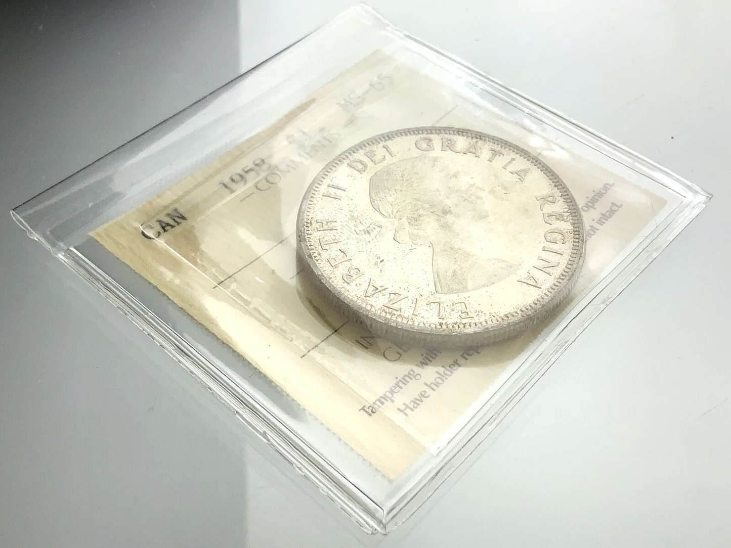 .600 ozt 1958 British Columbia MS-65 $1