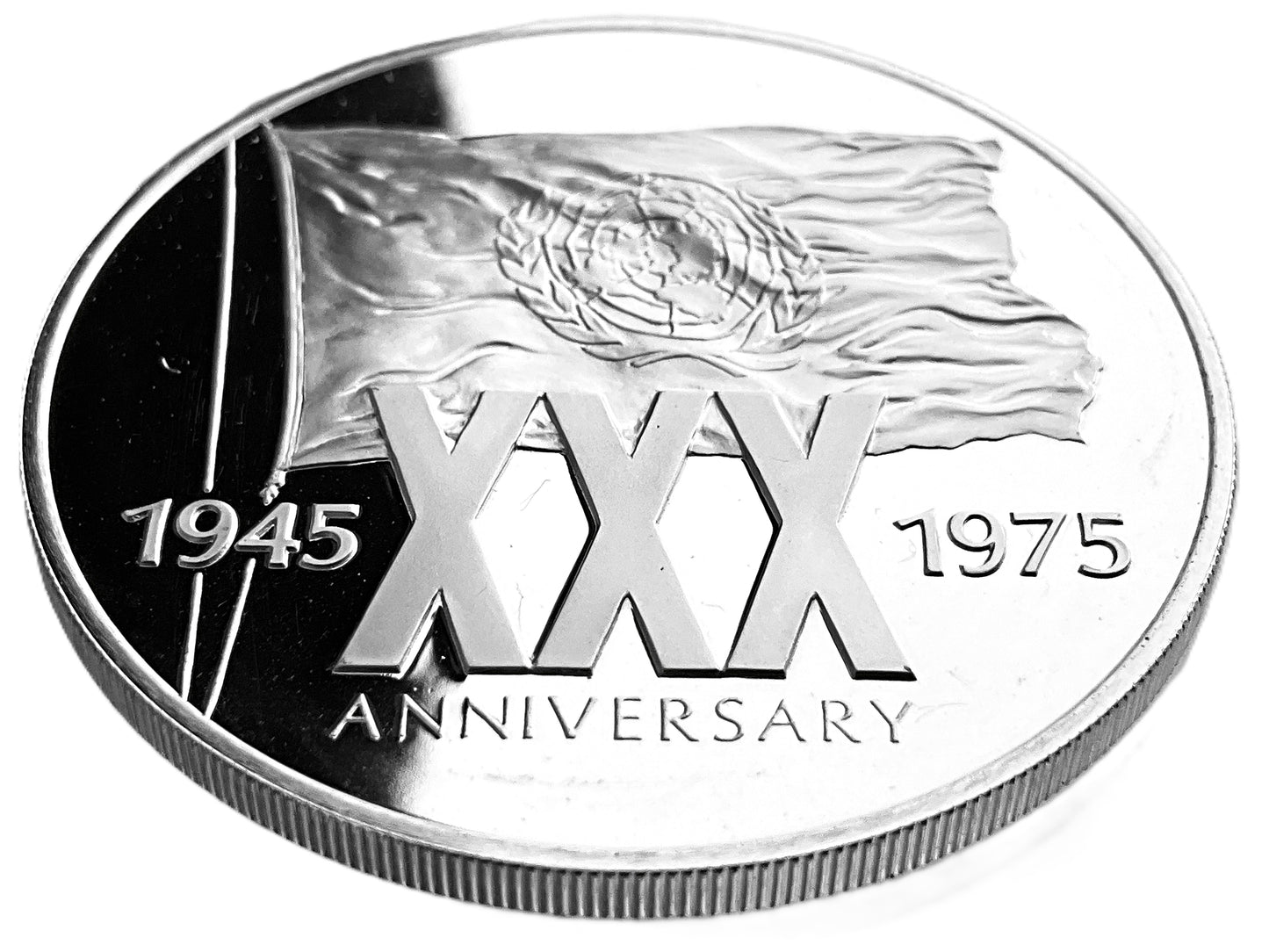 .601 ozt UN XXX Anniversary Silver Round
