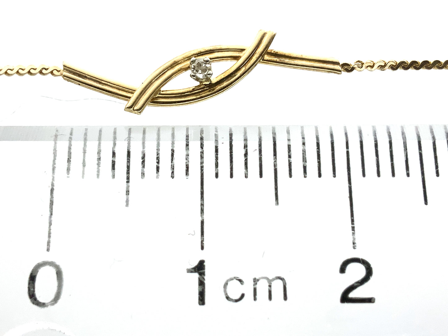 10K Yellow Gold Interlocking Design Feature with Round Solitaire Moissanite Chain 8 in x 1 mm Bracelet AU351