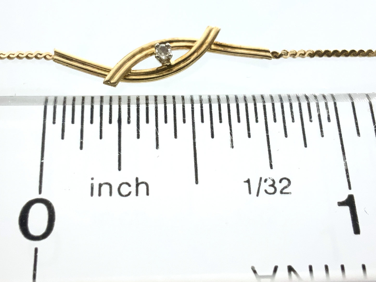 10K Yellow Gold Interlocking Design Feature with Round Solitaire Moissanite Chain 8 in x 1 mm Bracelet AU351