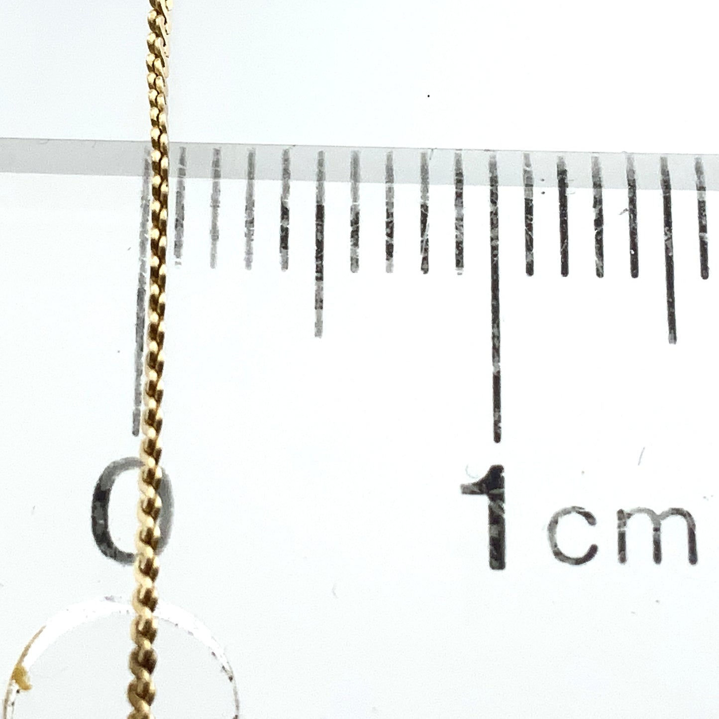 10K Yellow Gold Interlocking Design Feature with Round Solitaire Moissanite Chain 8 in x 1 mm Bracelet AU351