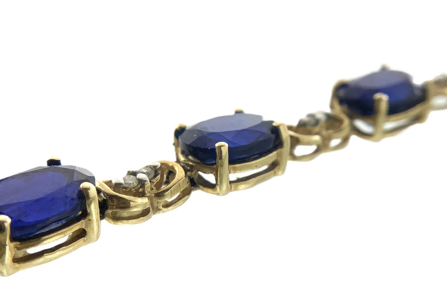 10K Yellow Gold Oval Blue Sapphires 7in x 5.1mm Bracelet AU386
