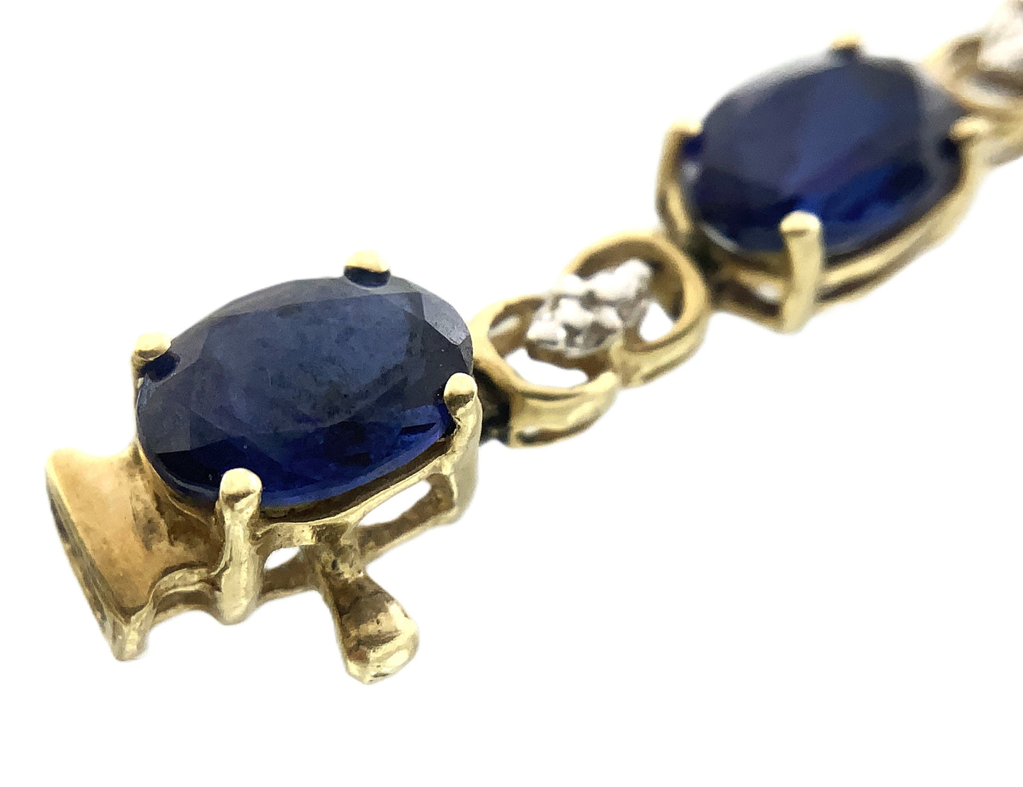 10K Yellow Gold Oval Blue Sapphires 7in x 5.1mm Bracelet AU386