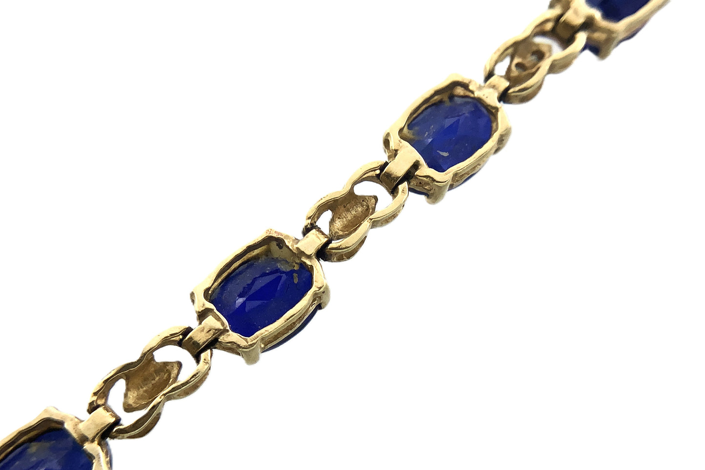 10K Yellow Gold Oval Blue Sapphires 7in x 5.1mm Bracelet AU386