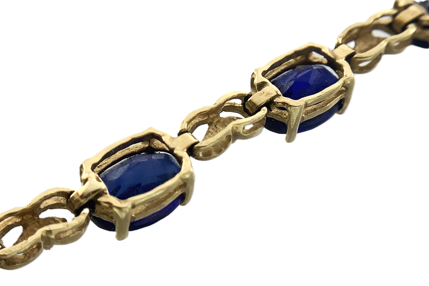 10K Yellow Gold Oval Blue Sapphires 7in x 5.1mm Bracelet AU386