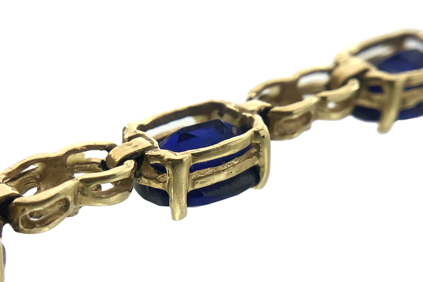 10K Yellow Gold Oval Blue Sapphires 7in x 5.1mm Bracelet AU386