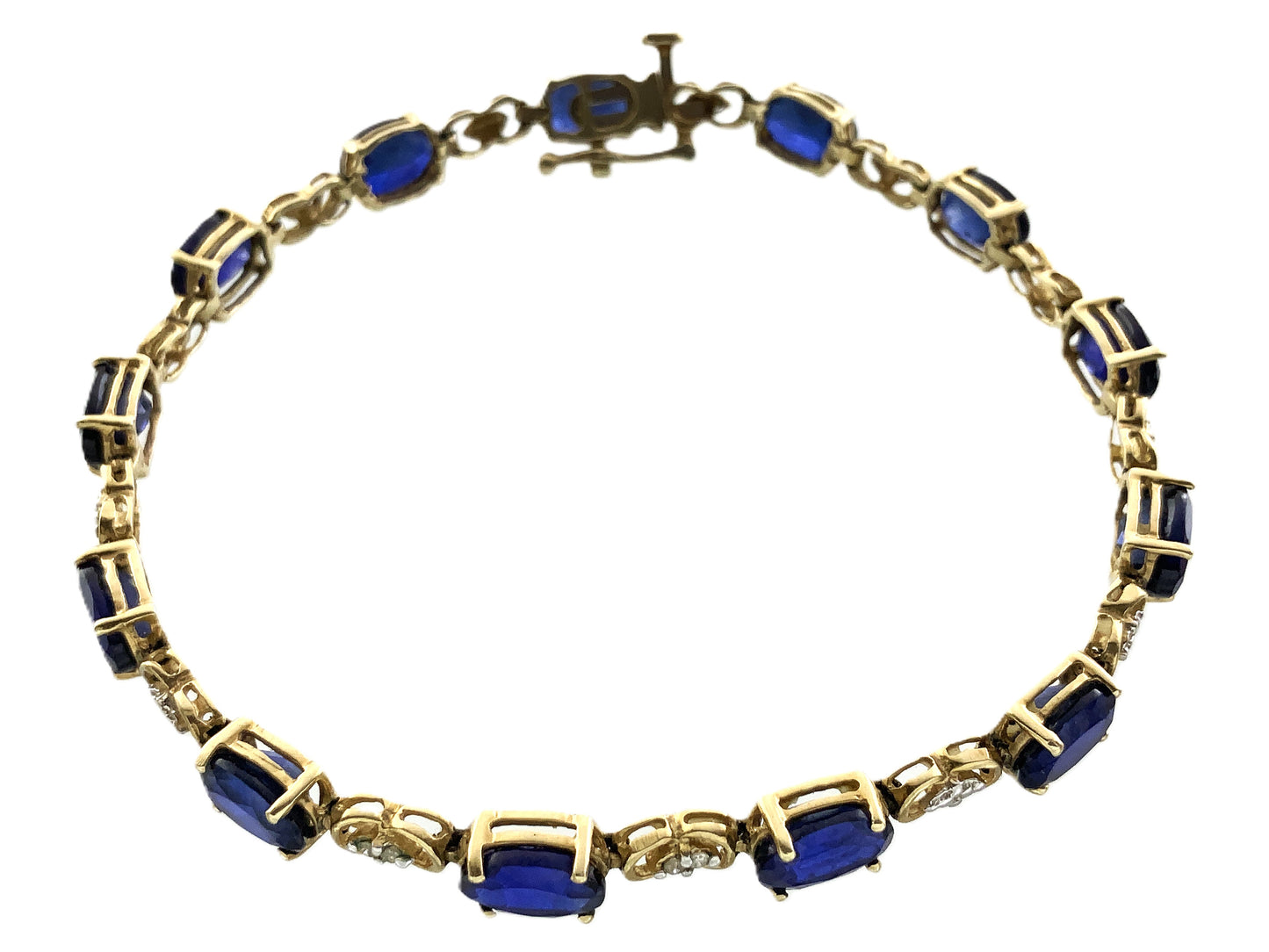 10K Yellow Gold Oval Blue Sapphires 7in x 5.1mm Bracelet AU386