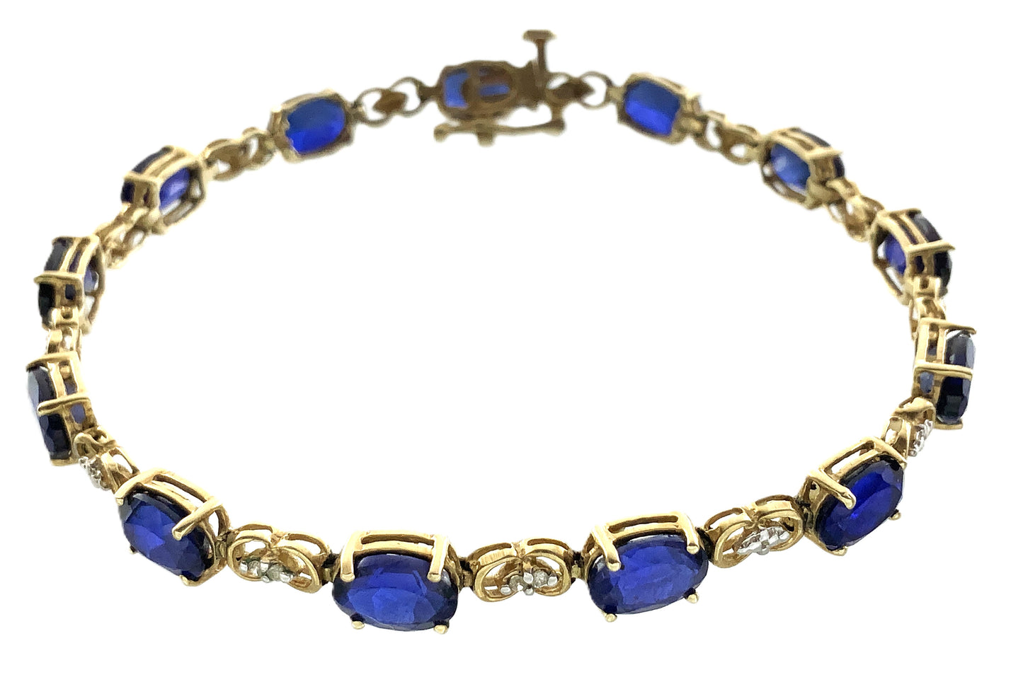 10K Yellow Gold Oval Blue Sapphires 7in x 5.1mm Bracelet AU386