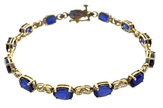 10K Yellow Gold Oval Blue Sapphires 7in x 5.1mm Bracelet AU386