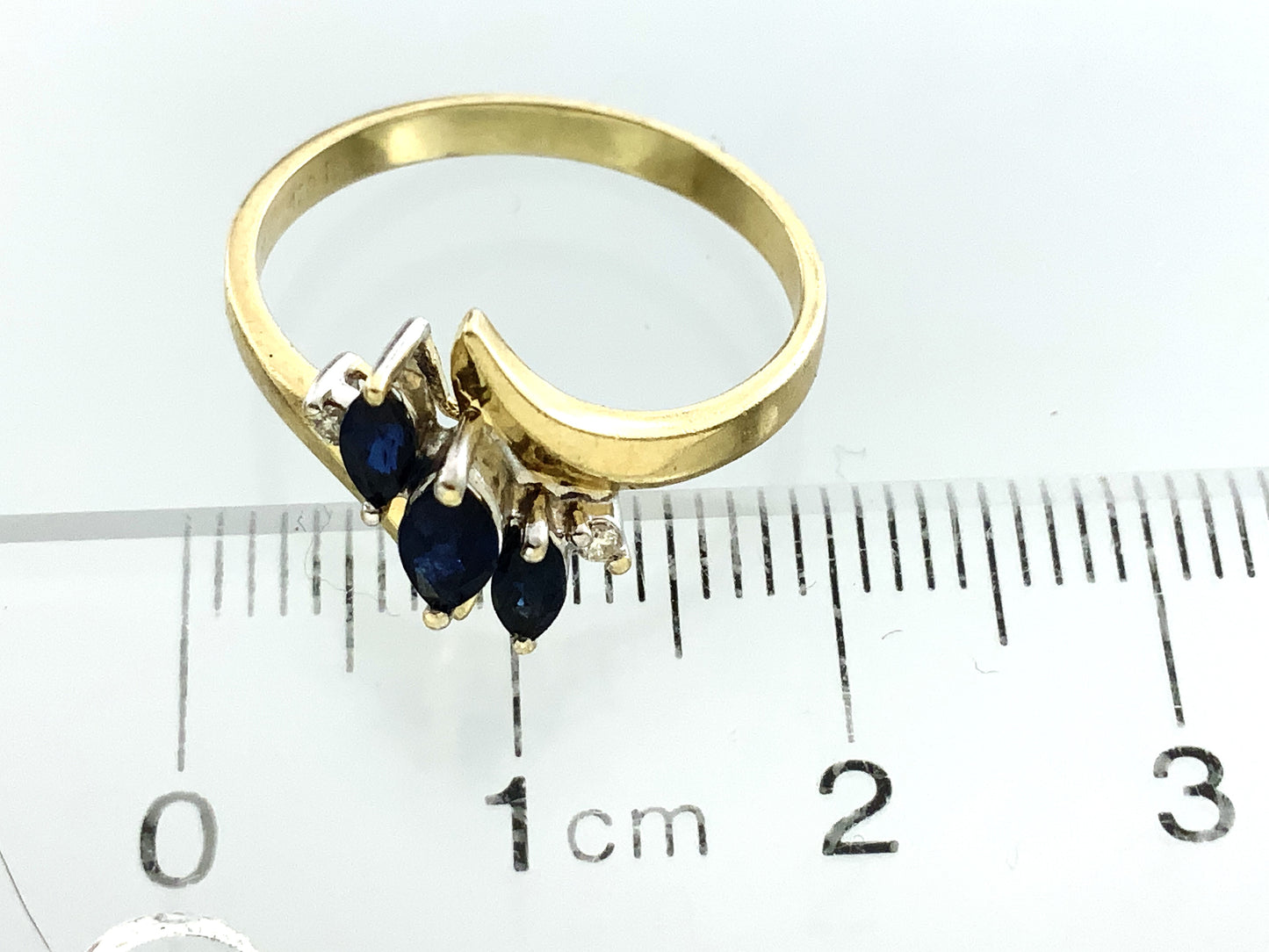 10K Yellow Gold 3 Marquise Cut Blue Sapphires with 2 Diamonds .04 Total Carats Size 6.5 Bypass Ring AU420