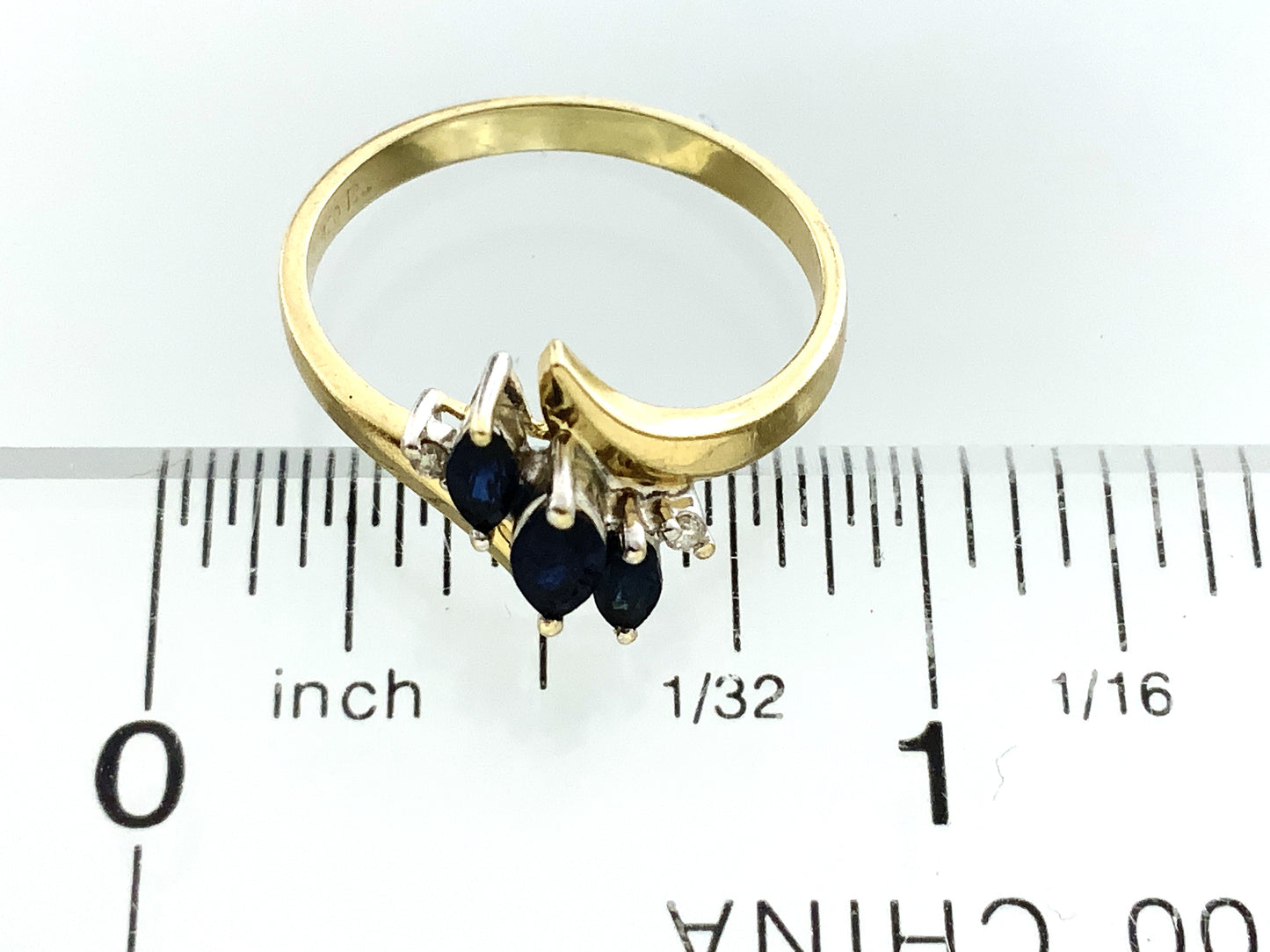 10K Yellow Gold 3 Marquise Cut Blue Sapphires with 2 Diamonds .04 Total Carats Size 6.5 Bypass Ring AU420