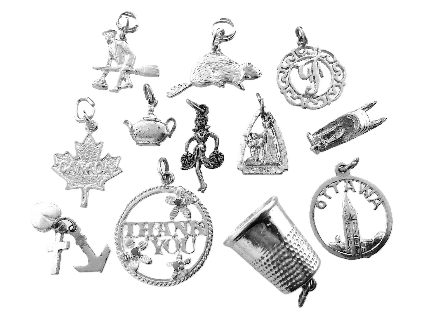 Lot of 12 Miscellaneous Pendant Charms Marked Ster 22.8 grams R591