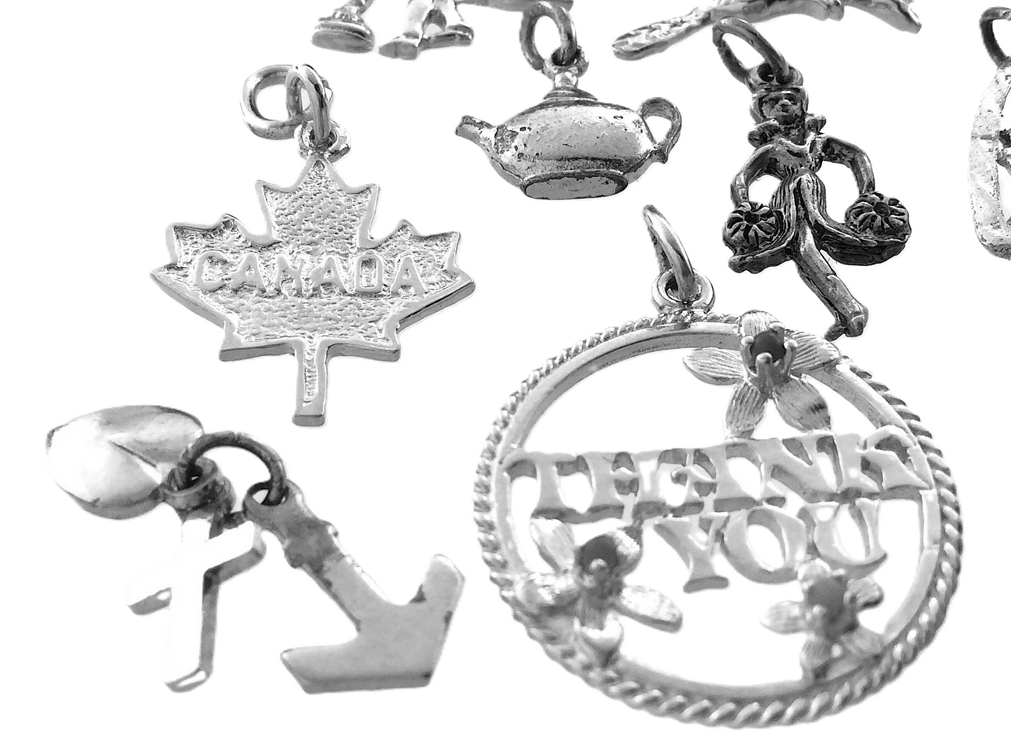 Lot of 12 Miscellaneous Pendant Charms Marked Ster 22.8 grams R591