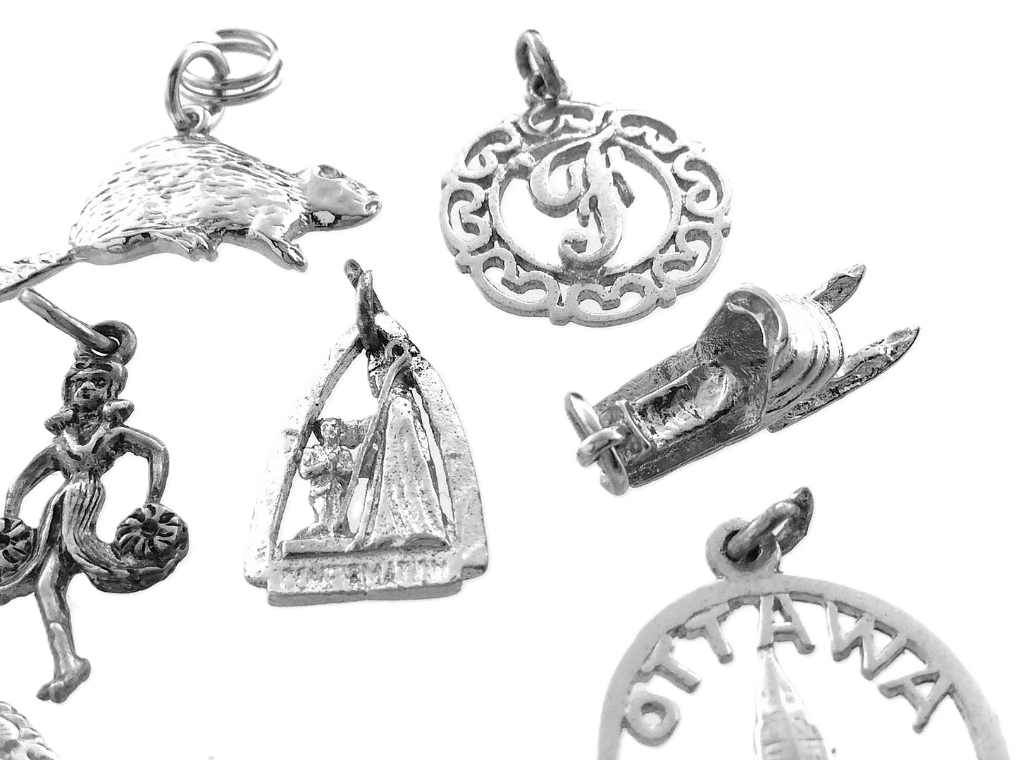 Lot of 12 Miscellaneous Pendant Charms Marked Ster 22.8 grams R591