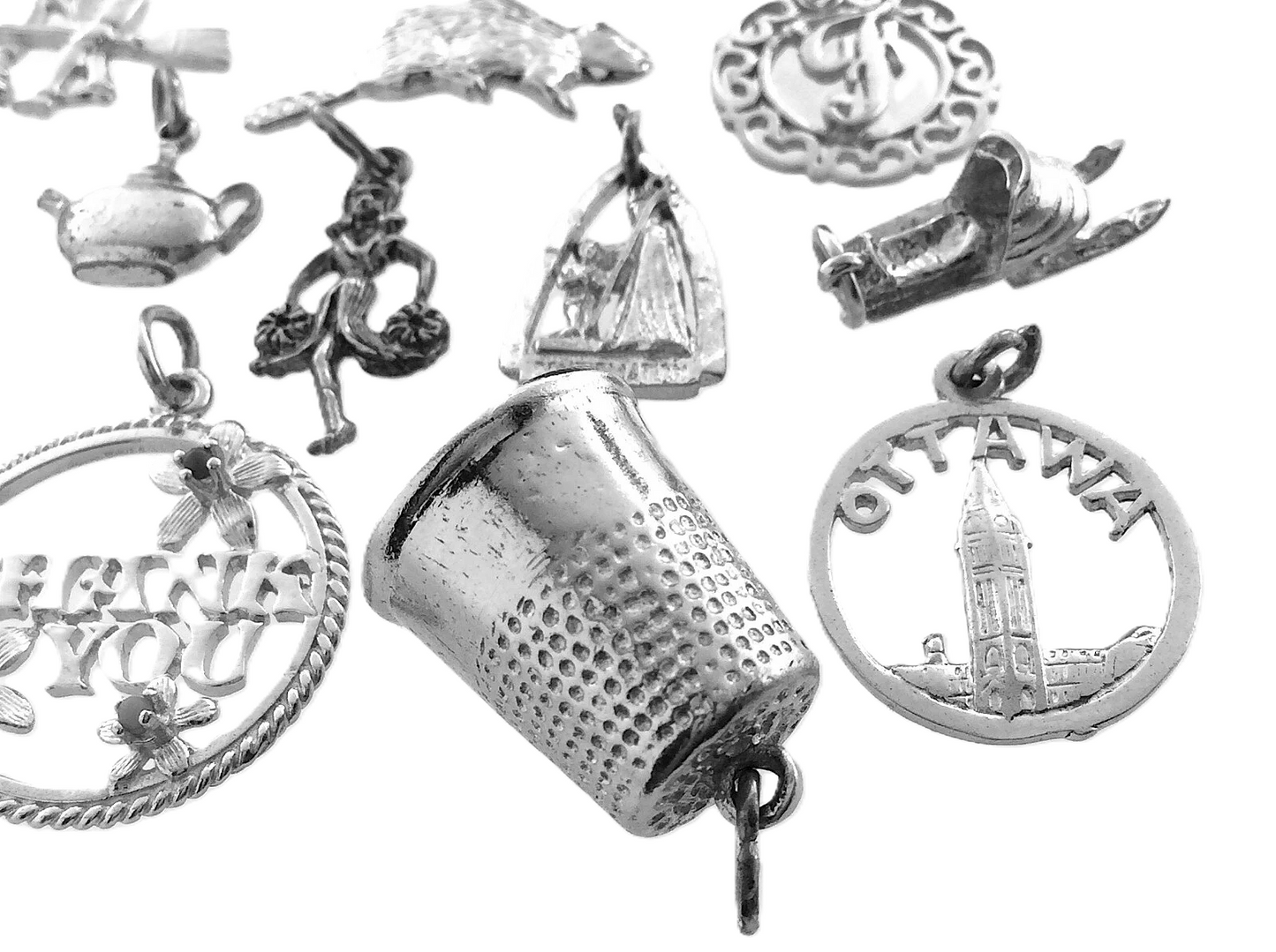 Lot of 12 Miscellaneous Pendant Charms Marked Ster 22.8 grams R591