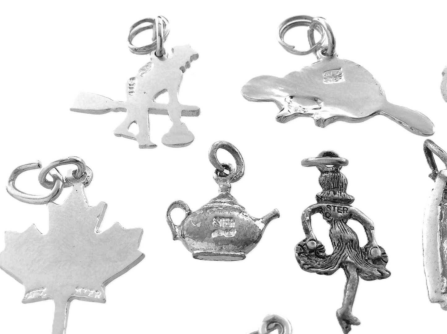 Lot of 12 Miscellaneous Pendant Charms Marked Ster 22.8 grams R591
